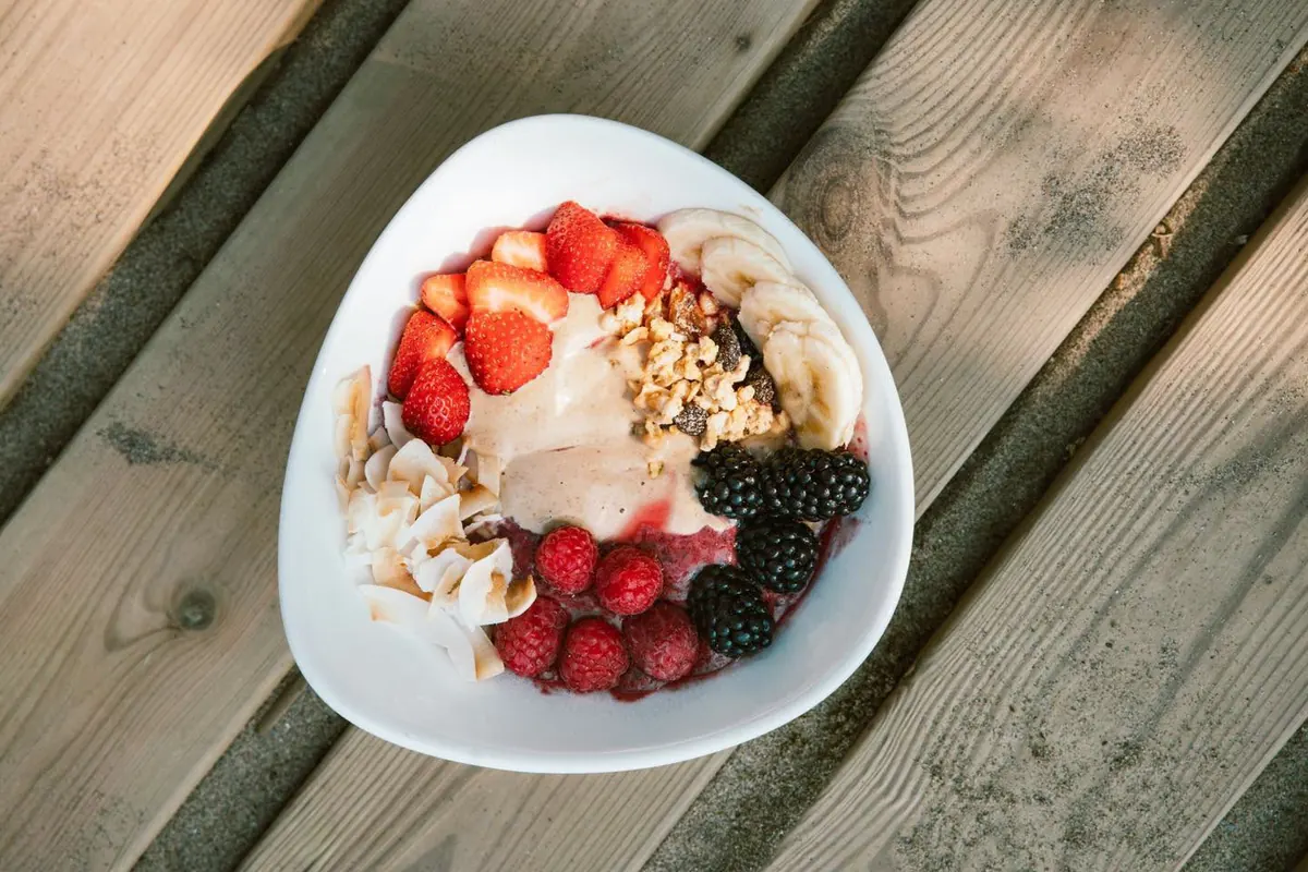 An açaí bowl with berries from above