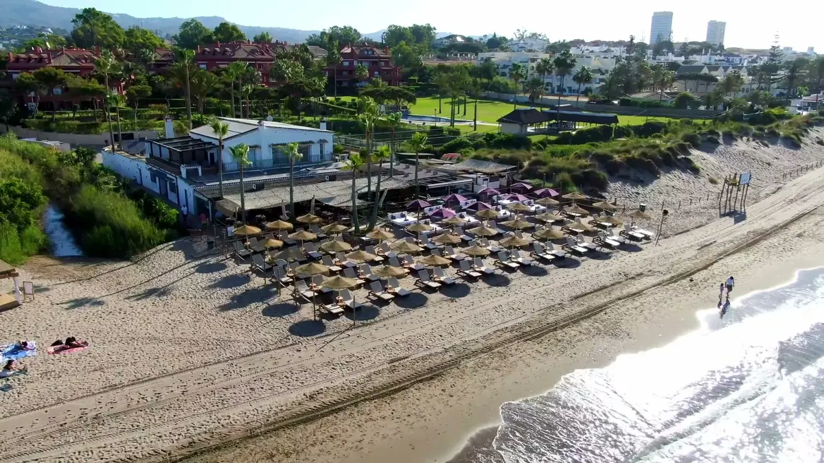 The Beach House and its beach club seen from above the shoreline